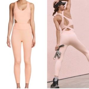 NEW FREE PEOPLE FP MOVEMENT WOMENS BACK IT UP ONESIE ONE PIECE MEDIUM PEACH